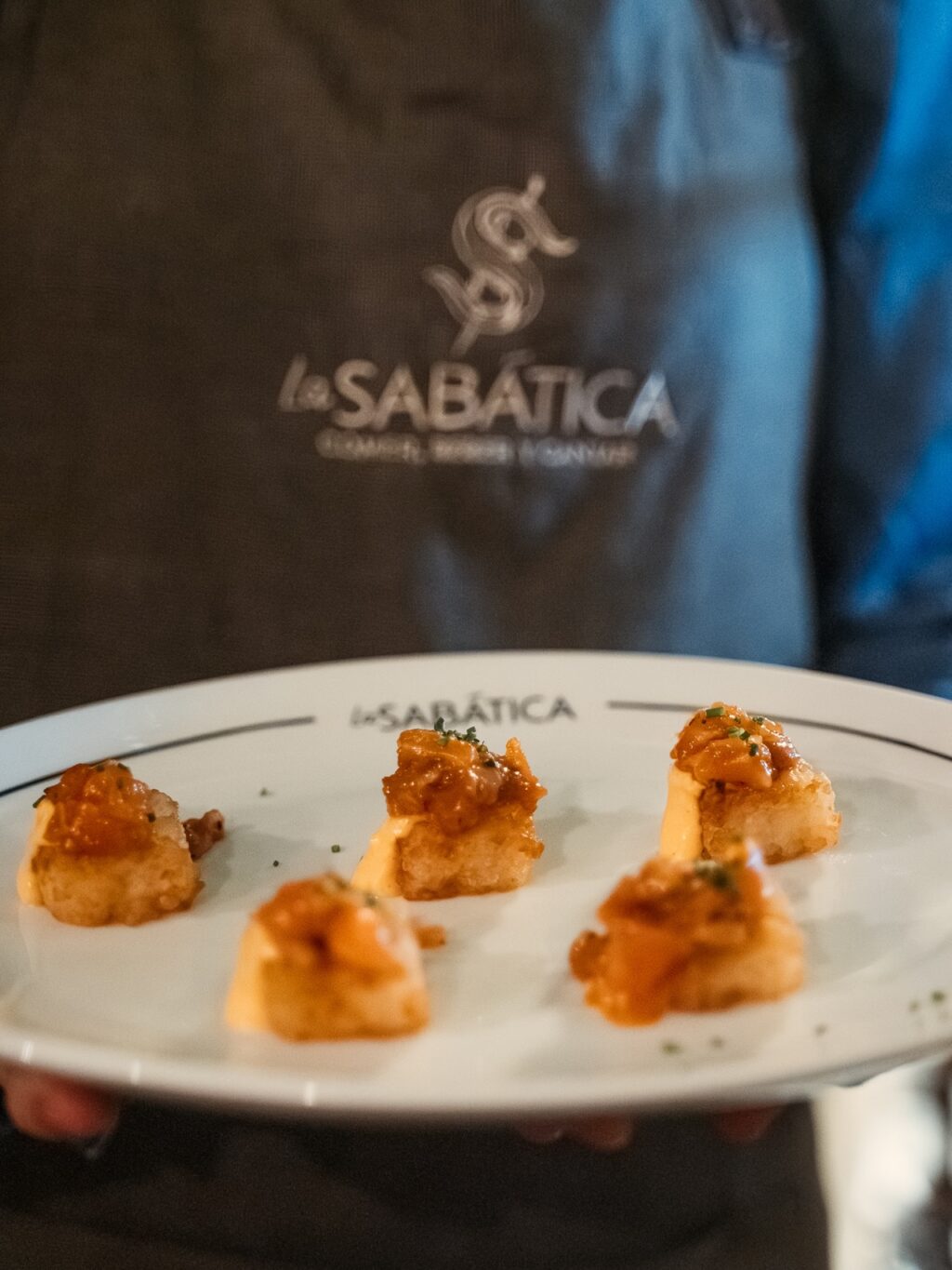 Instagram post from lasabatica_sevilla. This post is in position 1.